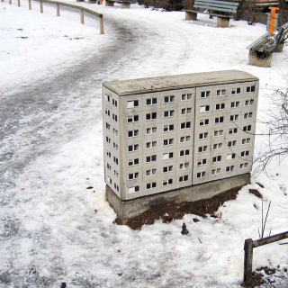 Illustration for article titled Artist Converts Everyday Objects Into Super-Realistic Miniature Apartment Buildings